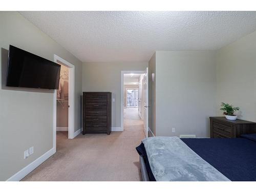 3049 Windsong Boulevard Sw, Airdrie, AB - Indoor Photo Showing Bedroom