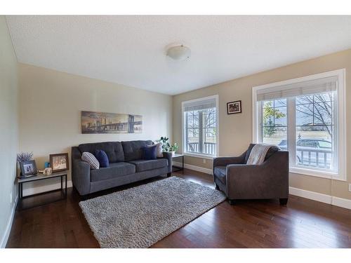 3049 Windsong Boulevard Sw, Airdrie, AB - Indoor Photo Showing Living Room