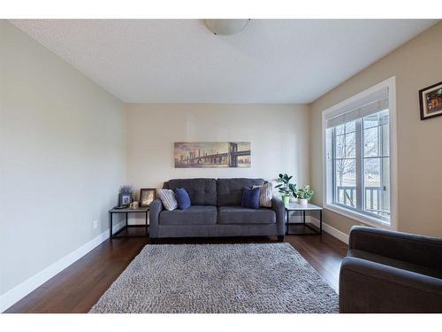 3049 Windsong Boulevard Sw, Airdrie, AB - Indoor Photo Showing Living Room