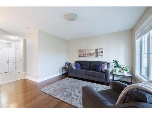 3049 Windsong Boulevard Sw, Airdrie, AB - Indoor Photo Showing Living Room