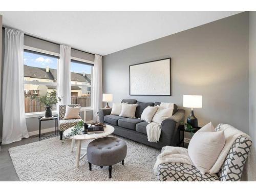 66 Legacy Close Se, Calgary, AB - Indoor Photo Showing Living Room