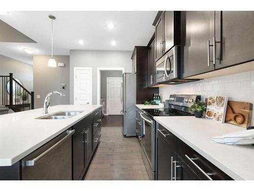 66 Legacy Close Se, Calgary, AB - Indoor Photo Showing Kitchen With Double Sink With Upgraded Kitchen