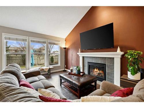 457 Mahogany Court Se, Calgary, AB - Indoor Photo Showing Living Room With Fireplace