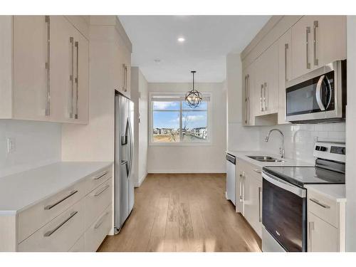 6327 128 Avenue Ne, Calgary, AB - Indoor Photo Showing Kitchen With Stainless Steel Kitchen With Double Sink With Upgraded Kitchen