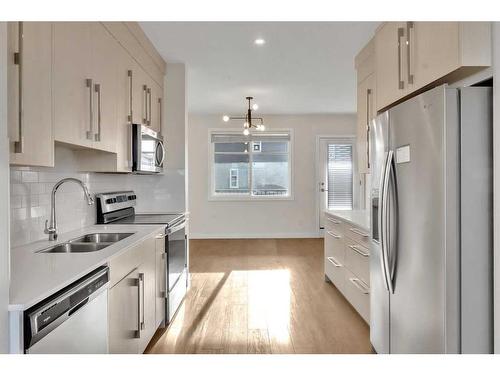 6327 128 Avenue Ne, Calgary, AB - Indoor Photo Showing Kitchen With Stainless Steel Kitchen With Double Sink With Upgraded Kitchen