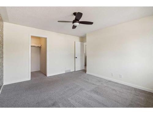 7 Shawmeadows Bay Sw, Calgary, AB - Indoor Photo Showing Other Room