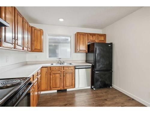 7 Shawmeadows Bay Sw, Calgary, AB - Indoor Photo Showing Kitchen With Double Sink