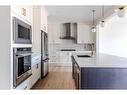 243 Marina Grove Se, Calgary, AB  - Indoor Photo Showing Kitchen With Upgraded Kitchen 