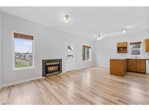 2664 Rundlelawn Road Ne, Calgary, AB - Indoor With Fireplace