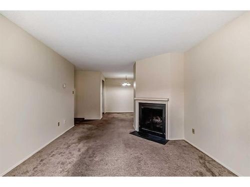 8106-315 Southampton Drive Sw, Calgary, AB - Indoor With Fireplace