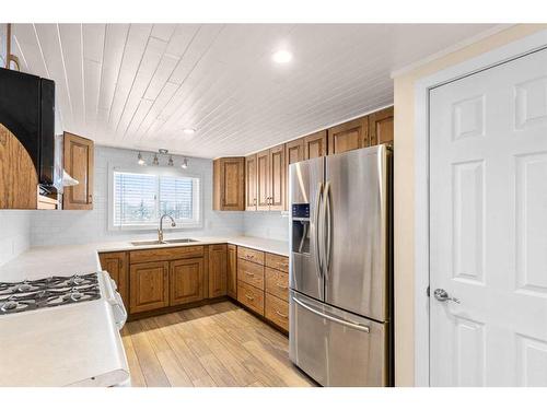 2541 Hwy 580, Rural Mountain View County, AB - Indoor Photo Showing Kitchen With Double Sink