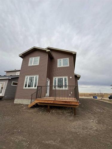 30 Clover Crescent, Beiseker, AB - Outdoor With Deck Patio Veranda