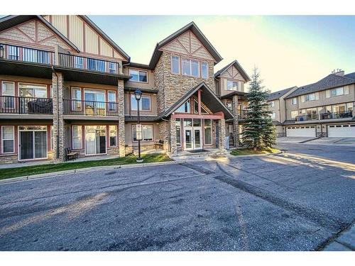 2101-211 Aspen Stone Boulevard Sw, Calgary, AB - Outdoor With Facade