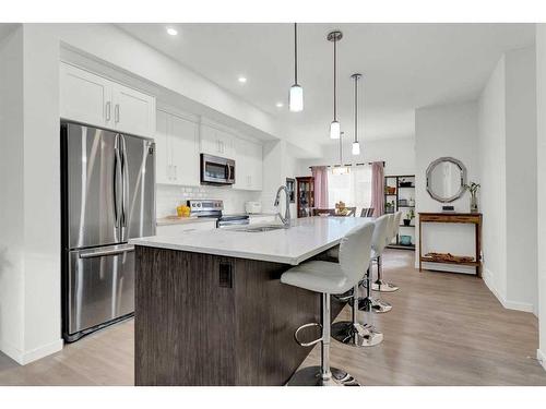 404 Harvest Grove Walk Ne, Calgary, AB - Indoor Photo Showing Kitchen With Stainless Steel Kitchen With Upgraded Kitchen