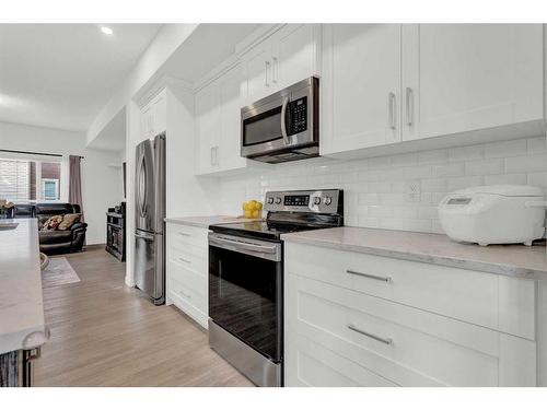 404 Harvest Grove Walk Ne, Calgary, AB - Indoor Photo Showing Kitchen With Stainless Steel Kitchen