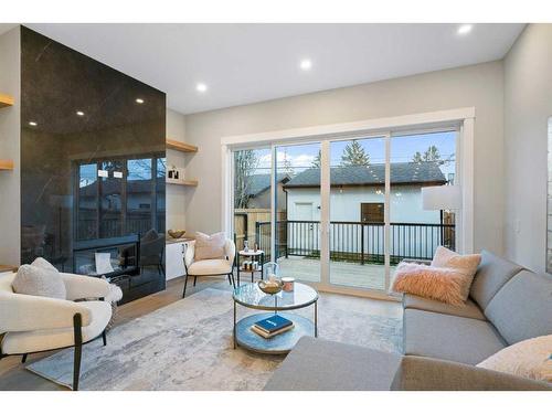 2414 35 Street Sw, Calgary, AB - Indoor Photo Showing Living Room With Fireplace