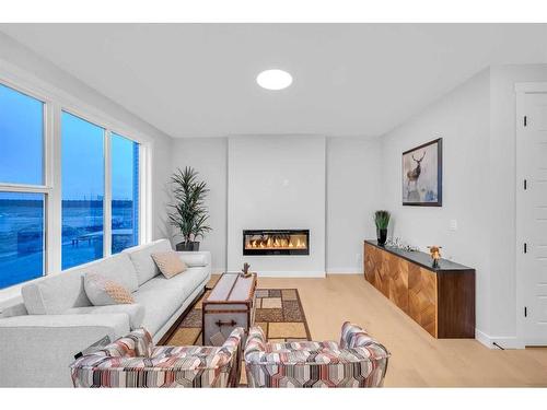 28 Cornerbrook Road Ne, Calgary, AB - Indoor Photo Showing Living Room With Fireplace