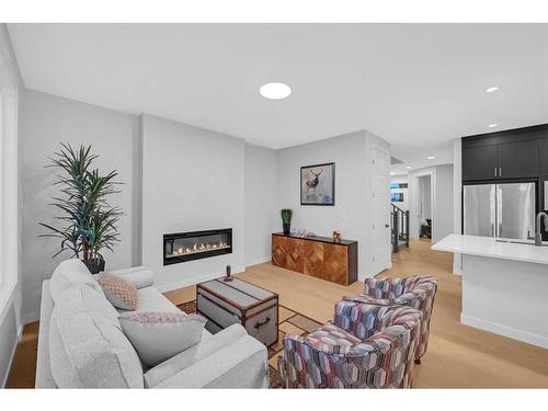 28 Cornerbrook Road Ne, Calgary, AB - Indoor Photo Showing Living Room With Fireplace