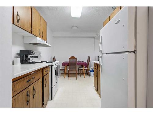 103-4328 4 Street Nw, Calgary, AB - Indoor Photo Showing Kitchen