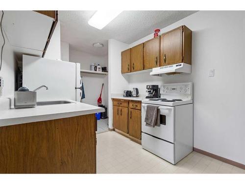 103-4328 4 Street Nw, Calgary, AB - Indoor Photo Showing Kitchen