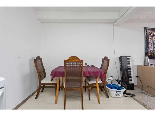 103-4328 4 Street Nw, Calgary, AB - Indoor Photo Showing Dining Room