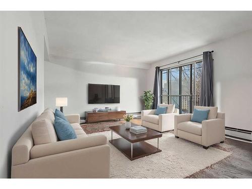 103-4328 4 Street Nw, Calgary, AB - Indoor Photo Showing Living Room