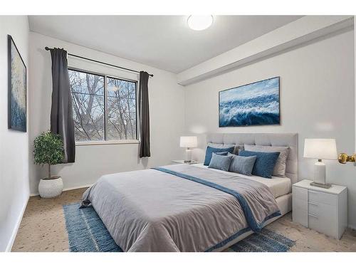 103-4328 4 Street Nw, Calgary, AB - Indoor Photo Showing Bedroom