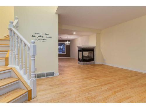 47 Prestwick Grove Se, Calgary, AB - Indoor With Fireplace