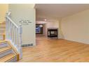 47 Prestwick Grove Se, Calgary, AB  - Indoor With Fireplace 