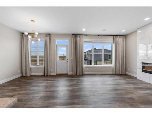 19 Homestead Close Ne, Calgary, AB - Indoor Photo Showing Living Room With Fireplace