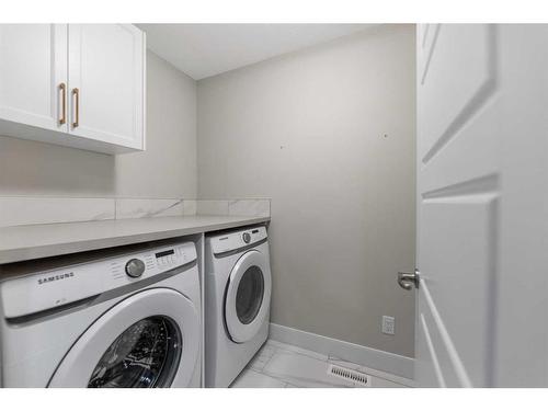 19 Homestead Close Ne, Calgary, AB - Indoor Photo Showing Laundry Room