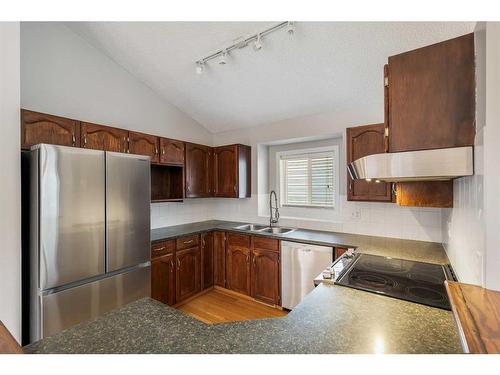 48 Macewan Meadow Rise Nw, Calgary, AB - Indoor Photo Showing Kitchen With Double Sink