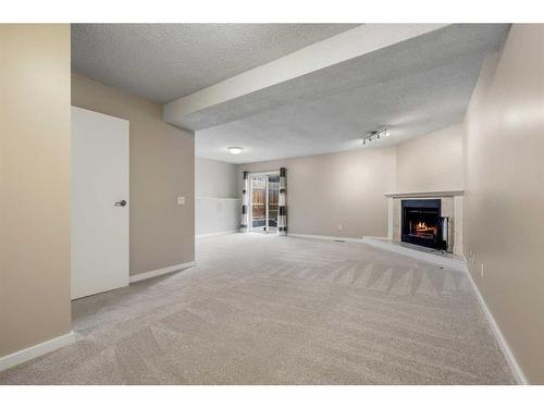 48 Macewan Meadow Rise Nw, Calgary, AB - Indoor With Fireplace