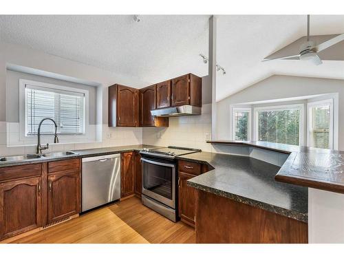 48 Macewan Meadow Rise Nw, Calgary, AB - Indoor Photo Showing Kitchen With Double Sink