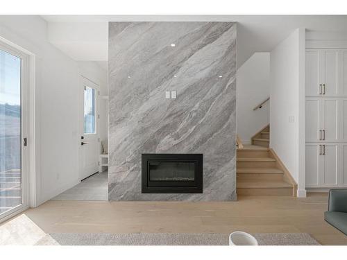 2614 31 Street Sw, Calgary, AB - Indoor Photo Showing Living Room With Fireplace