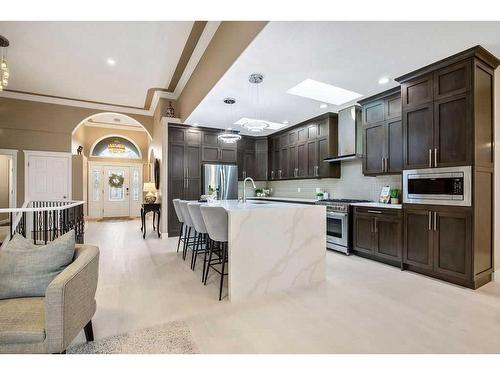 9 Simcrest Manor Sw, Calgary, AB - Indoor Photo Showing Kitchen With Upgraded Kitchen