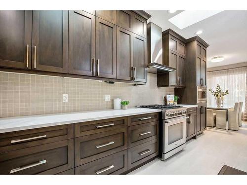 9 Simcrest Manor Sw, Calgary, AB - Indoor Photo Showing Kitchen With Upgraded Kitchen