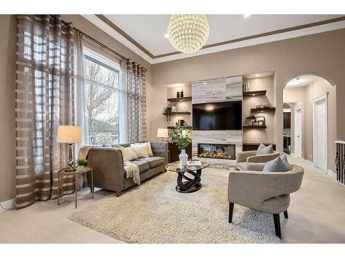 9 Simcrest Manor Sw, Calgary, AB - Indoor Photo Showing Living Room With Fireplace