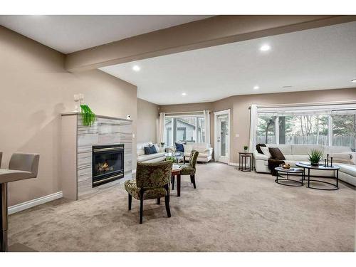 9 Simcrest Manor Sw, Calgary, AB - Indoor With Fireplace