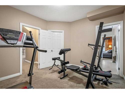 9 Simcrest Manor Sw, Calgary, AB - Indoor Photo Showing Gym Room