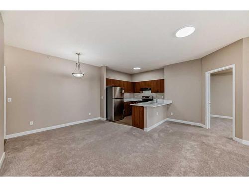 1417-1140 Taradale Drive Ne, Calgary, AB - Indoor Photo Showing Kitchen