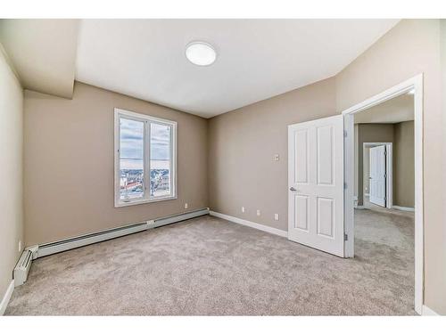 1417-1140 Taradale Drive Ne, Calgary, AB - Indoor Photo Showing Other Room