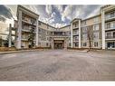 1417-1140 Taradale Drive Ne, Calgary, AB  - Outdoor With Balcony With Facade 