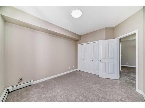 1417-1140 Taradale Drive Ne, Calgary, AB - Indoor Photo Showing Other Room