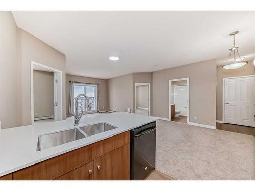 1417-1140 Taradale Drive Ne, Calgary, AB - Indoor Photo Showing Kitchen With Double Sink