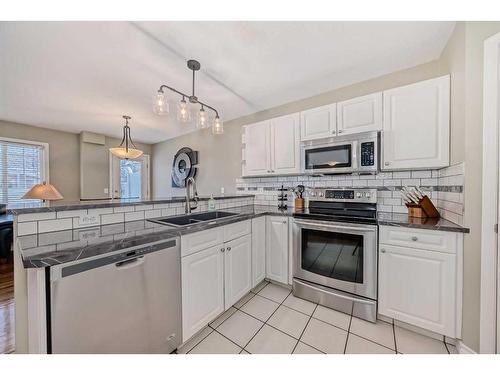 29 Chaparral Ridge Terrace Se, Calgary, AB - Indoor Photo Showing Kitchen With Double Sink With Upgraded Kitchen