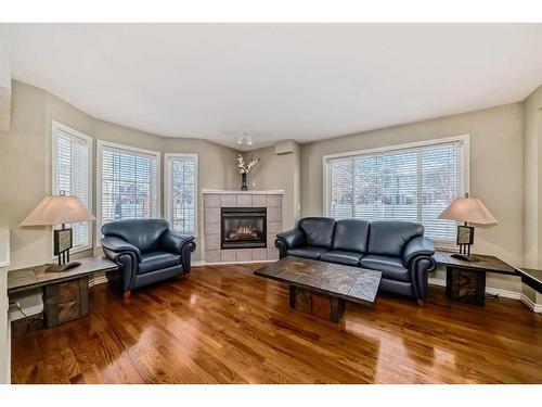 29 Chaparral Ridge Terrace Se, Calgary, AB - Indoor Photo Showing Living Room With Fireplace