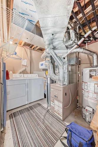 29 Chaparral Ridge Terrace Se, Calgary, AB - Indoor Photo Showing Laundry Room