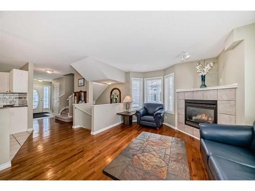 29 Chaparral Ridge Terrace Se, Calgary, AB - Indoor Photo Showing Living Room With Fireplace