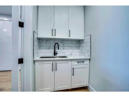 160 Saddlelake Manor Ne, Calgary, AB - Indoor Photo Showing Kitchen With Double Sink